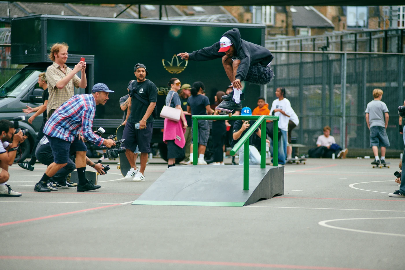 Skater clearing a rail at the adidas Tyshawn II London skate jam